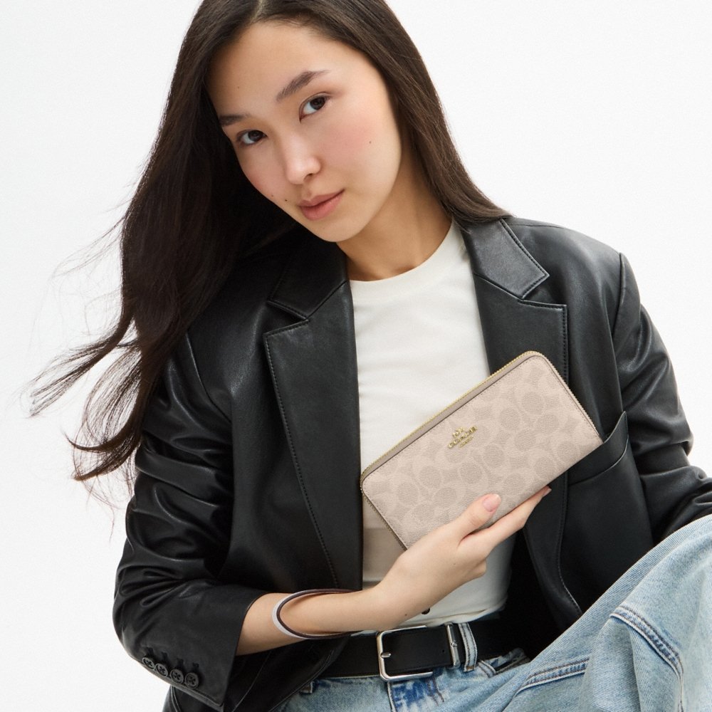 Coach Outlet Long Zip Around Wallet In Signature Canvas - Preorder