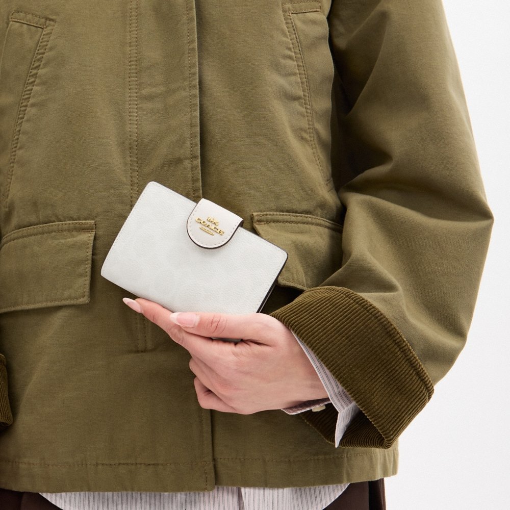 Coach Outlet Medium Corner Zip Wallet In Signature Canvas - Preorder