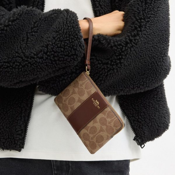 Coach Outlet Corner Zip Wristlet In Signature Canvas With Stripe - Preorder