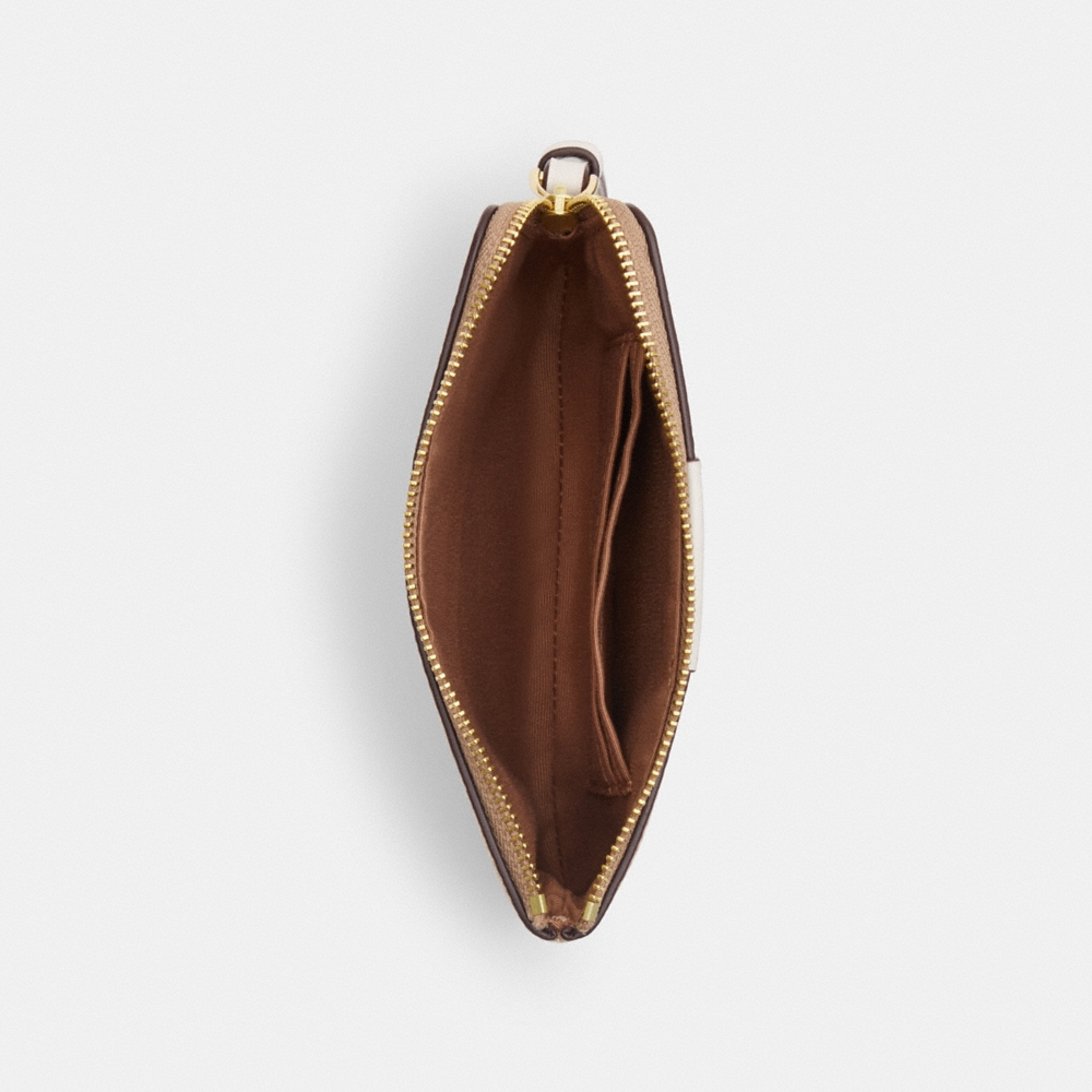 Coach Outlet Corner Zip Wristlet In Signature Canvas With Stripe - Preorder