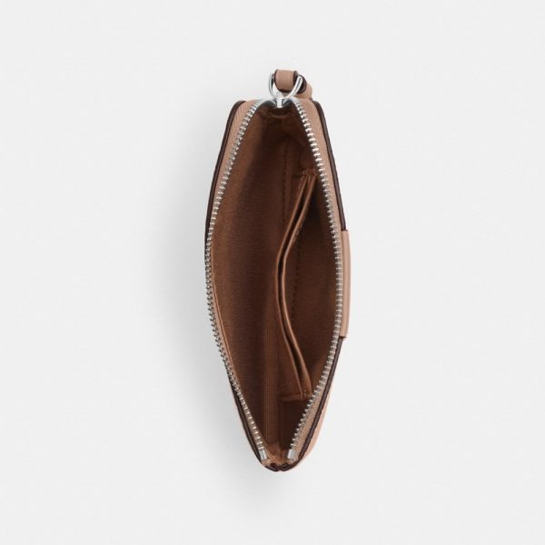 Coach Outlet Corner Zip Wristlet In Signature Canvas With Stripe - Preorder