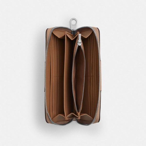 Coach Outlet Long Zip Around Wallet In Signature Canvas With Stripe - Preorder