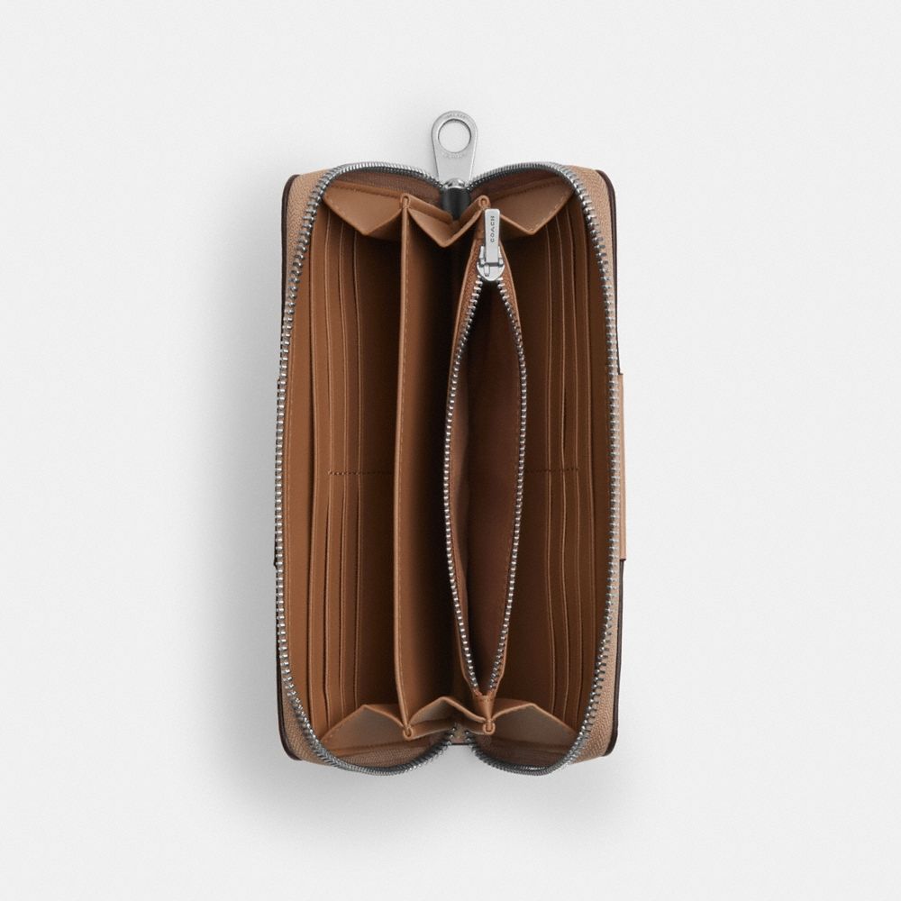 Coach Outlet Long Zip Around Wallet In Signature Canvas With Stripe - Preorder