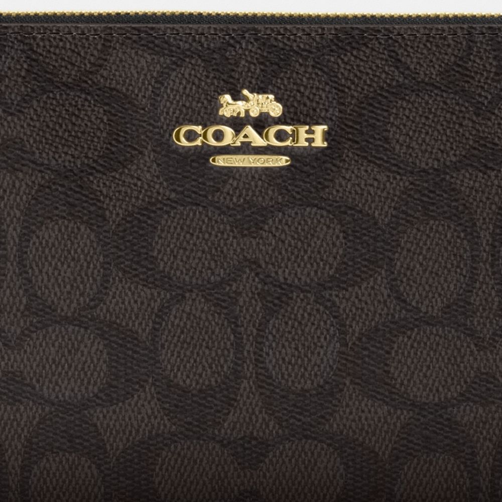 Coach Outlet Large Corner Zip Wristlet In Signature Canvas - Preorder