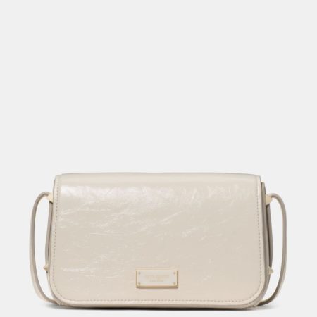 Kate Spade Outlet Liv Crinkle Patent Crossbody Bag - Preorder — Cashew Milk
