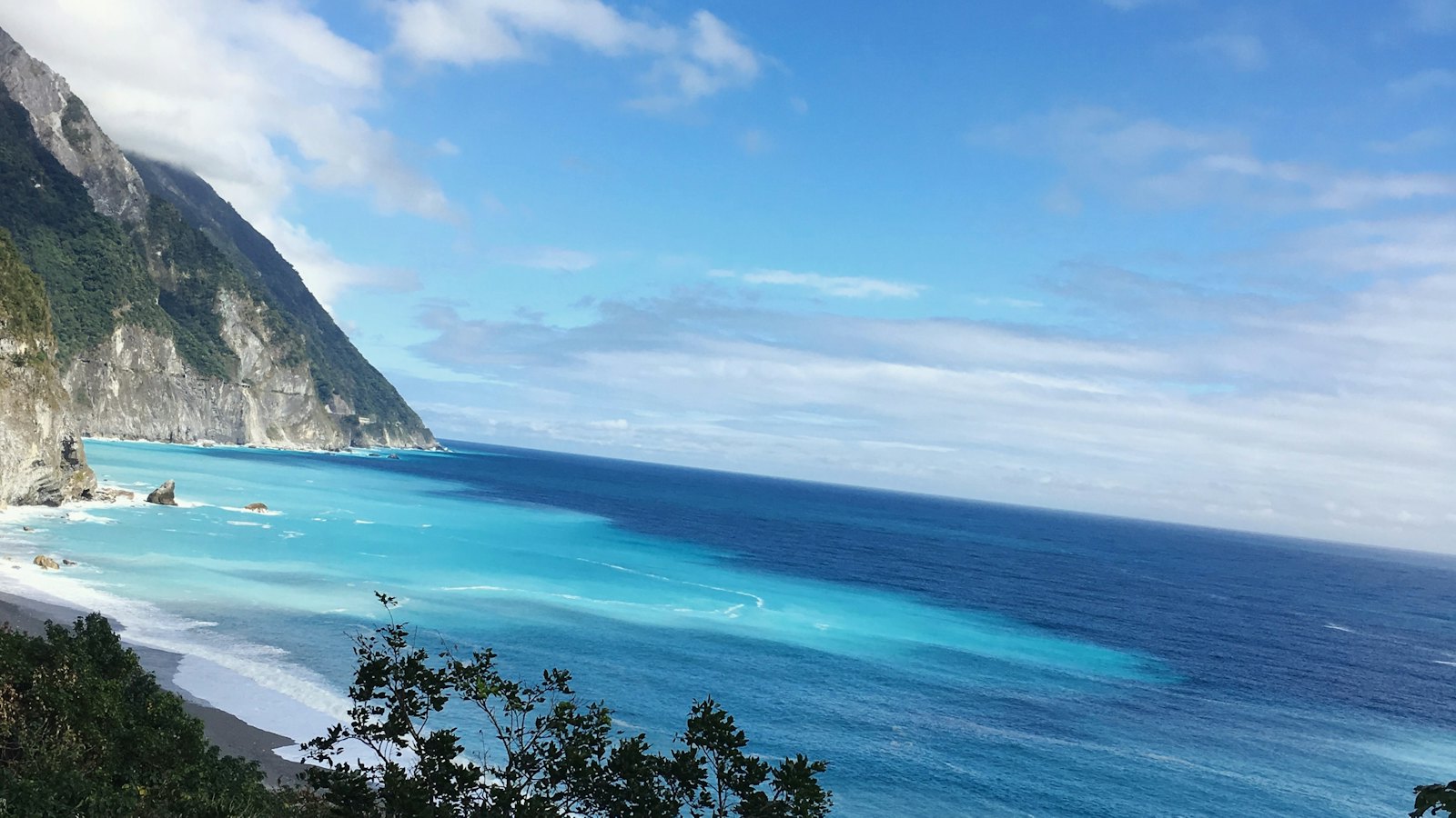 Turquoise sea below the dramatic sea cliffs on Hualien's eastern coast