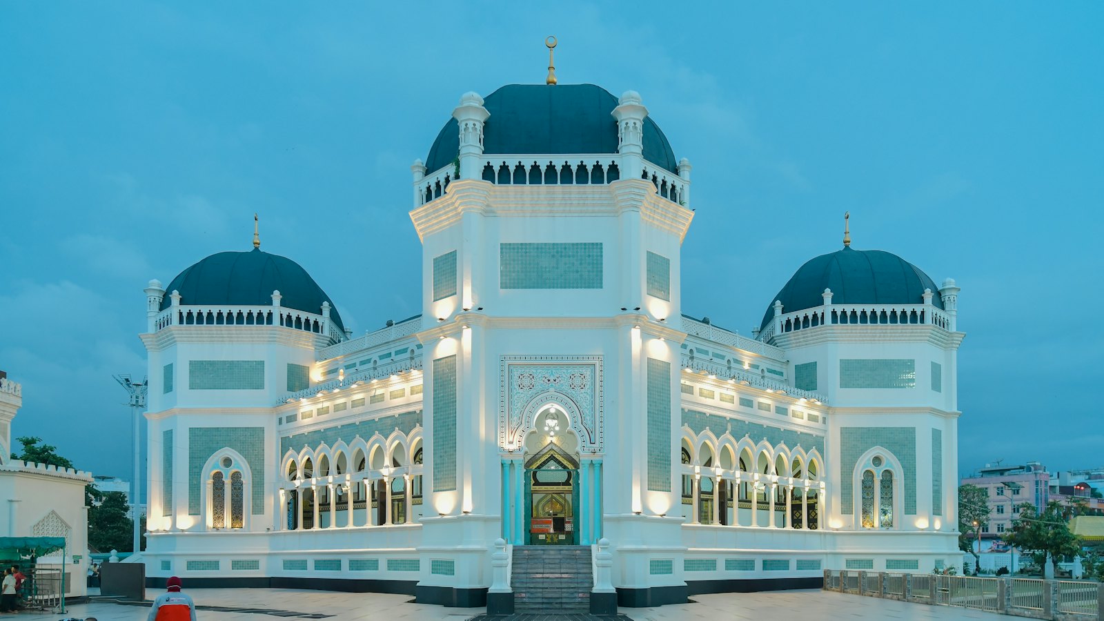 The Great Mosque of Medan, Masjid Raya Al-Mashun, lit up at blue hour