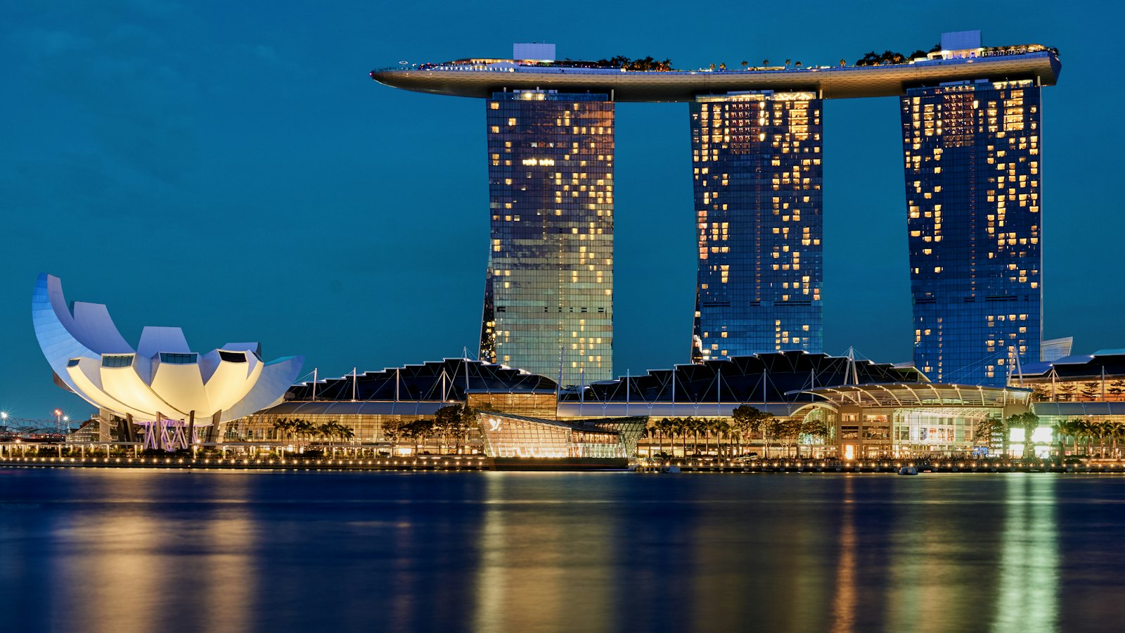 Marina Bay Sands and the bay lit up at blue hour, Singapore